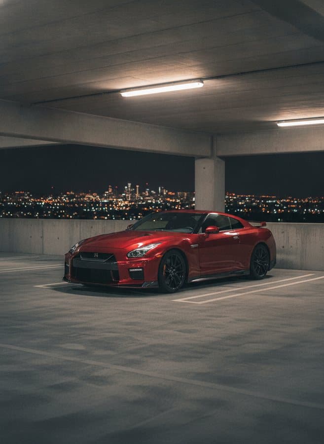 Parking Deck 7 — Top level, empty, city behind